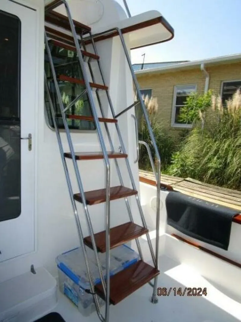Slide: The Image of 42' Sabre cockpit-flybridge stairs - 7384991