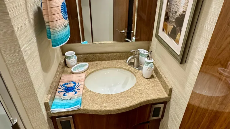 Slide: The Image of Guest Head Head with vanity and enclosed shower. - 8440622