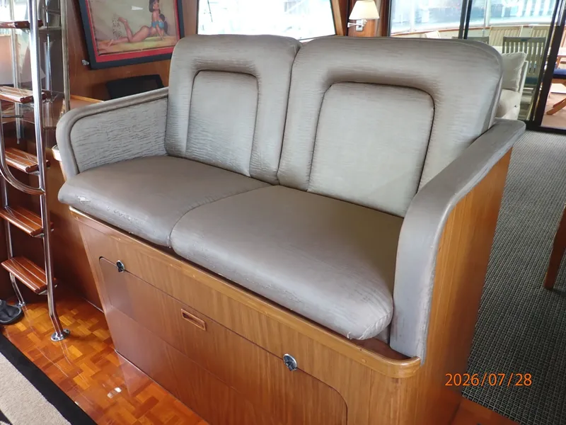 Slide: The Image of 54' Hatteras pilothouse helm benchseat - 7288103