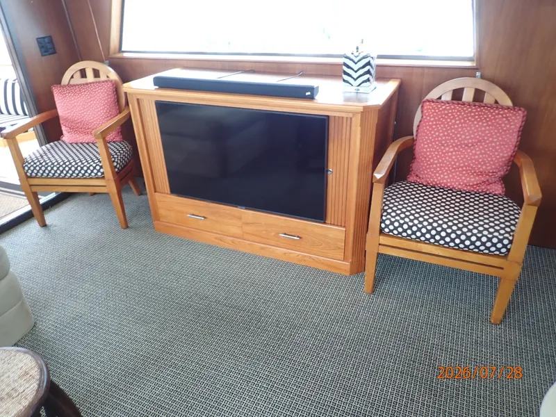Slide: The Image of 54' Hatteras salon port seating - 7288145