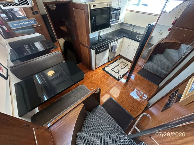 Slide: The Image of 54' Hatteras galley-dinette forward - 7288070