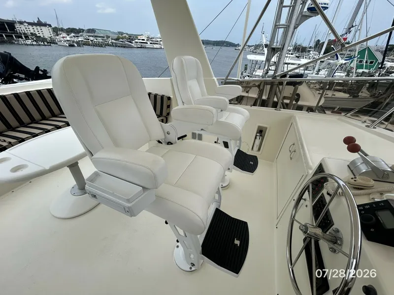 Slide: The Image of 54' Hatteras flybridge helmseats - 7288056