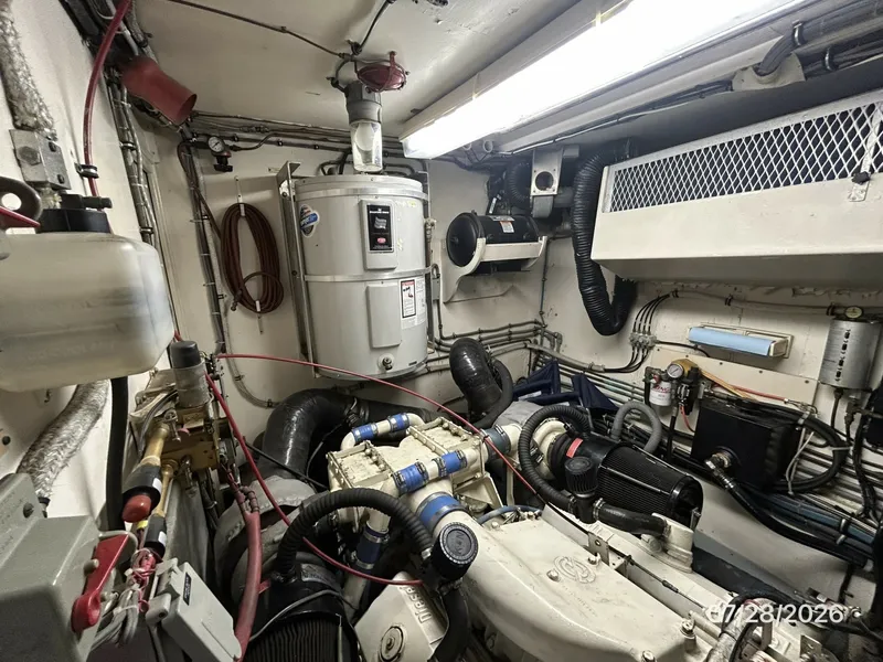 Slide: The Image of 54' Hatteras port engine room aft - 7288132