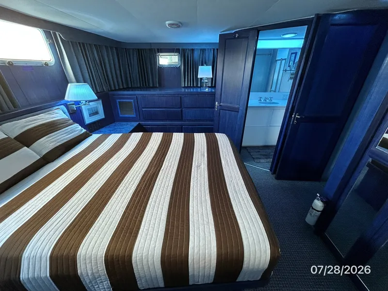 Slide: The Image of 54' Hatteras master stateroom port - 7288085