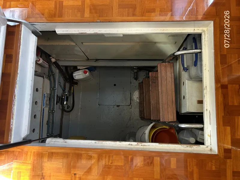 Slide: The Image of 54' Hatteras generator room access - 7288074