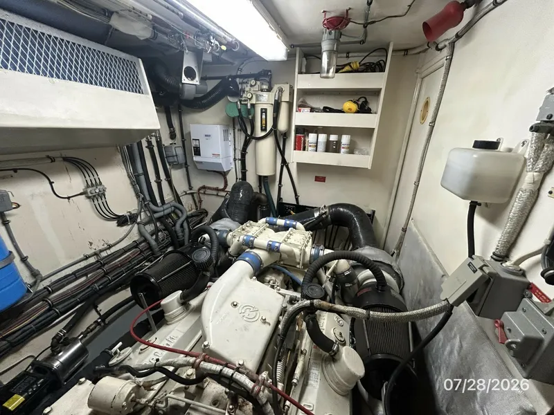 Slide: The Image of 54' Hatteras starboard engine room aft - 7288151