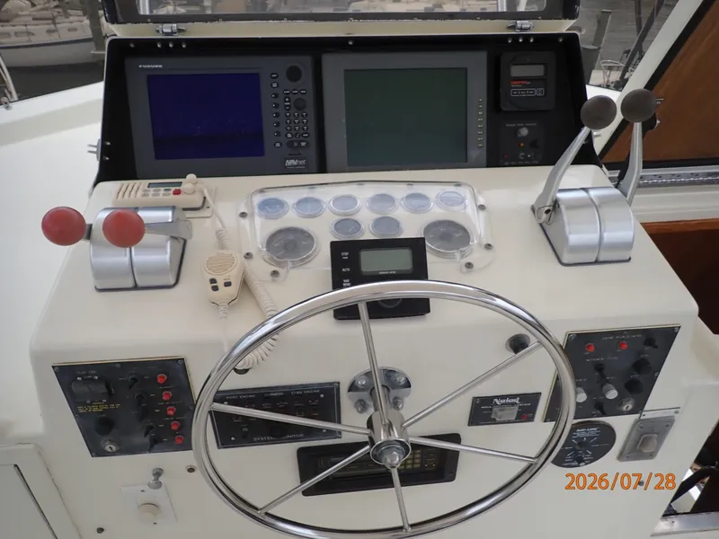 Slide: The Image of 54' Hatteras flybridge helm2 - 7288055
