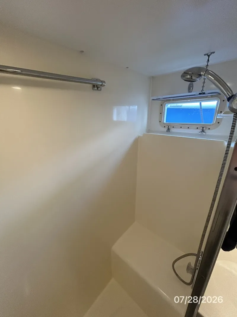 Slide: The Image of 54' Hatteras port guest shower - 7288137
