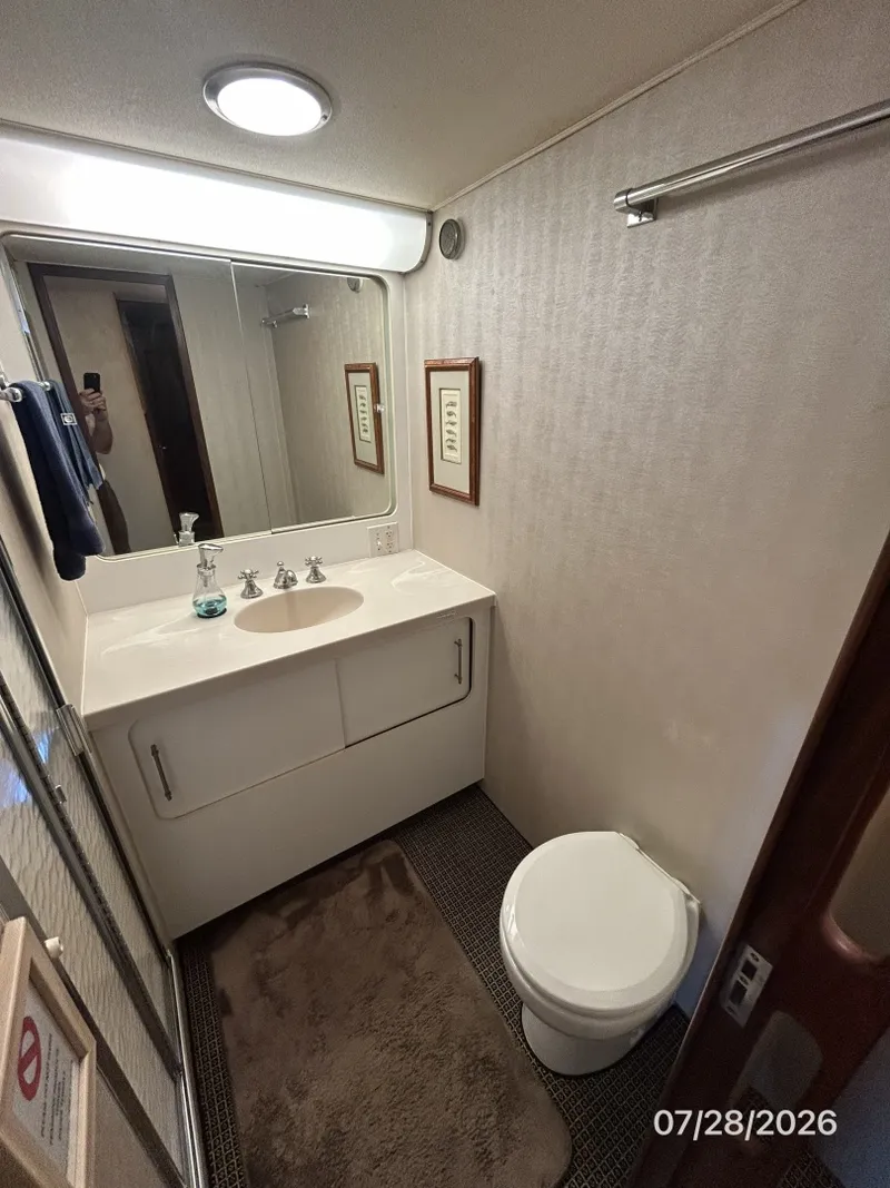 Slide: The Image of 54' Hatteras port guest head - 7288136