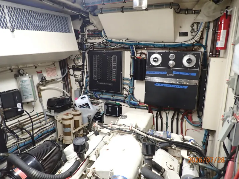 Slide: The Image of 54' Hatteras port engine room forward - 7288135