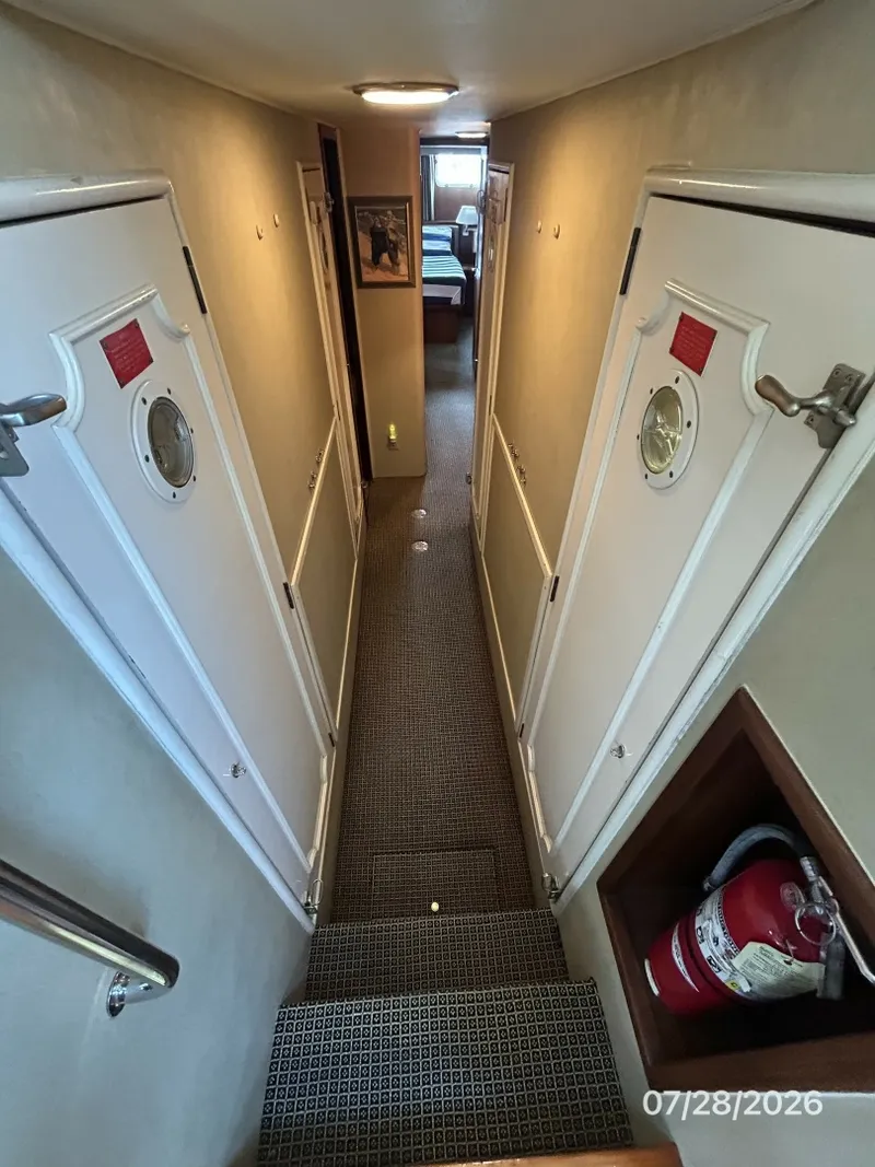 Slide: The Image of 54' Hatteras companionway aft - 7288048