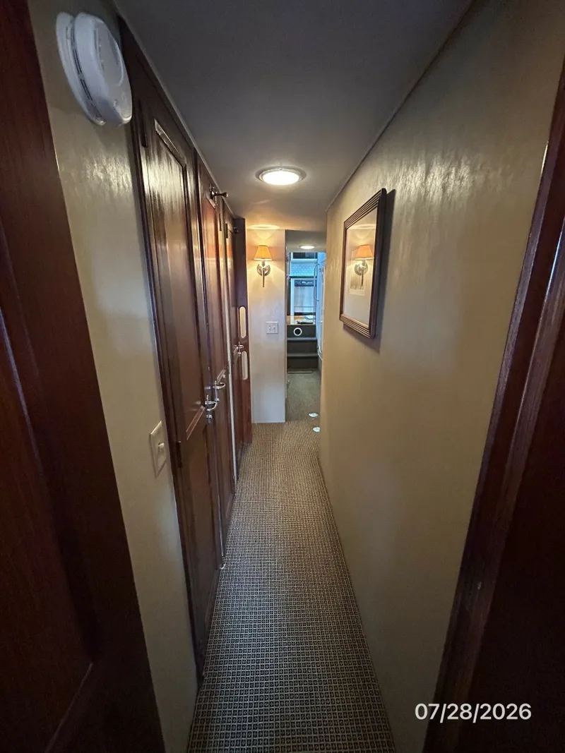 Slide: The Image of 54' Hatteras companionway forward - 7288049