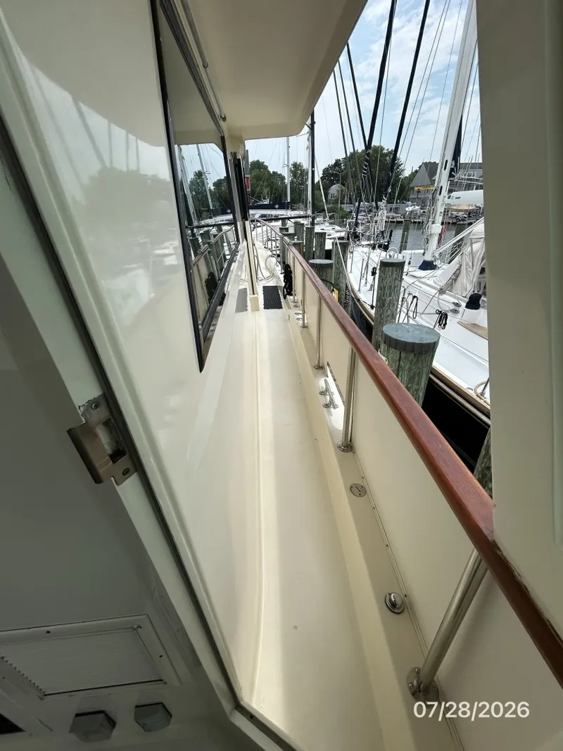 Slide: The Image of 54' Hatteras starboard side deck2 - 7288158