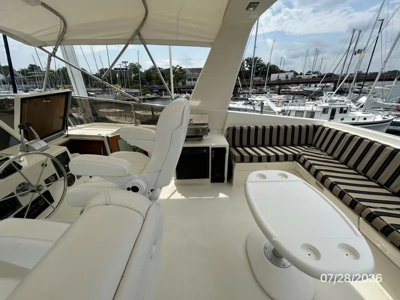 Slide: The Image of 54' Hatteras flybridge starboard - 7288059