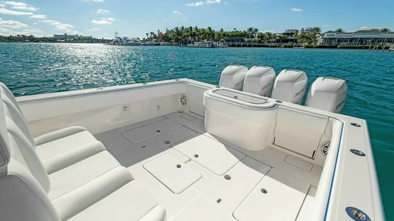 Slide: The Image of Spacious Aft Deck with Seating The aft deck of the 2019 Invincible 42 Open Fisherman offers ample seating and a spacious layout ideal for fishing or leisure. The clean, non-slip deck design ensures safety and functionality, while the integrated storage compartments keep essentials orga - 7285522