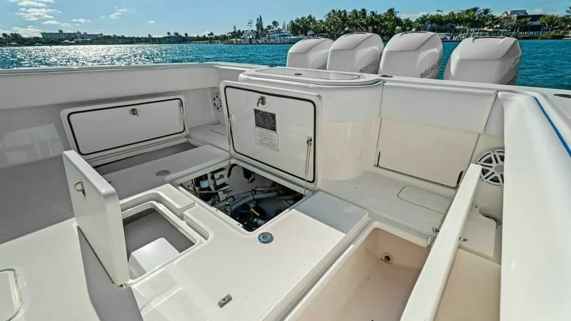 Slide: The Image of Spacious Aft Deck with Storage Access The aft deck of the 2019 Invincible 42 Open Fisherman offers ample space for both leisure and fishing activities. Featuring multiple storage compartments and easy access hatches, this area is designed for convenience and functionality. The clean, non-slip - 7285526