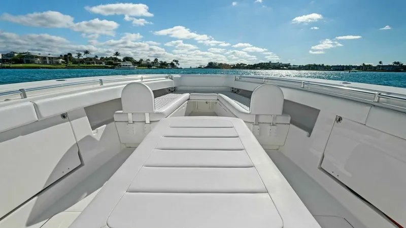 Slide: The Image of Spacious Forward Lounge Area The bow of the 2019 Invincible 42 Open Fisherman features a luxurious forward lounge area, perfect for relaxation. Plush, padded seating offers comfort while enjoying panoramic ocean views. The sleek design and high-quality finishes create an inviting spa - 7285513