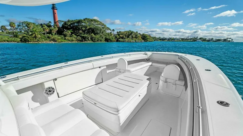 Slide: The Image of Spacious Bow Seating Area The bow of the 2019 Invincible 42 Open Fisherman offers a luxurious seating area perfect for relaxation and socializing. Plush, cushioned seats and a large center console provide comfort and convenience, while ample storage space enhances functionality. T - 7285512