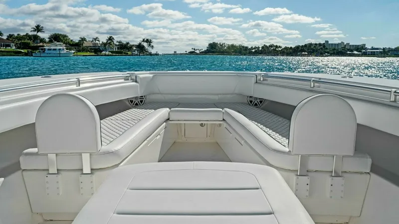 Slide: The Image of Spacious Bow Seating Area The Invincible 42 Open Fisherman's bow features elegant and spacious seating, perfect for relaxation and enjoying the view. Wrapped in premium upholstery, the seating area offers comfort and style, with ample space for socializing or lounging. The open la - 7285514