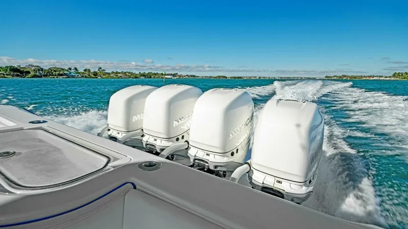 Slide: The Image of Powerful Quad Outboard Engines This image showcases the impressive quad outboard engines of the 2019 Invincible 42 Open Fisherman. These engines deliver exceptional power and performance, ideal for high-speed cruising and offshore fishing. The sleek design and robust construction ensur - 7285524