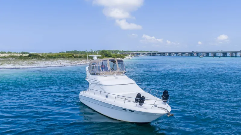 Slide: The Image of 2000 40 Sea Ray 400 Sedan Bridge Barely Covered Starboard - 7285496