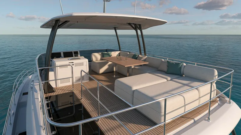 Slide: The Image of Flybridge with Lounge Seating The flybridge of the NEW PRESTIGE M6 EVO offers an inviting space with plush, modular lounge seating, perfect for relaxation and socializing. A stylish teak table serves as an ideal centerpiece for al fresco dining, all under the protection of a sleek, mo - 7312514
