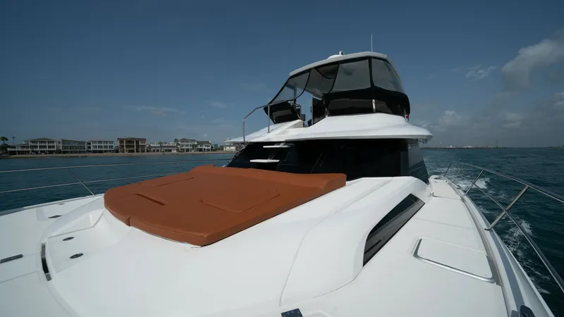 Slide: The Image of Foredeck with Sun Pad Lounge The foredeck of the 2021 Aquila 44 CAT features a spacious sun pad lounge, perfect for relaxation while cruising. This area provides ample space for sunbathing and enjoying panoramic views of the surroundings. The sleek lines and modern design of the fore - 7413999