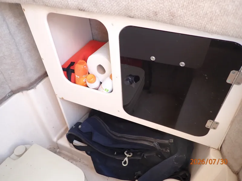 Slide: The Image of 22' Grady-White console interior storage - 7350175