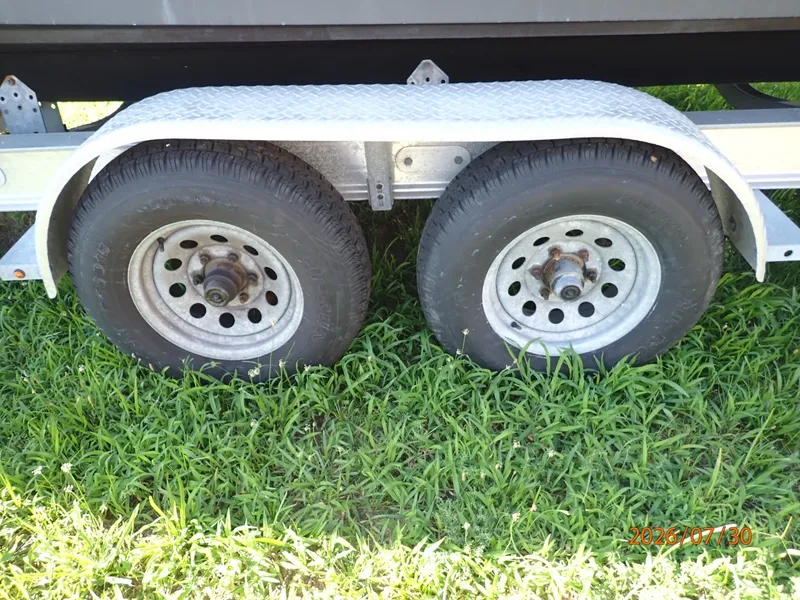 Slide: The Image of 22' Grady-White trailer port wheels - 7350298