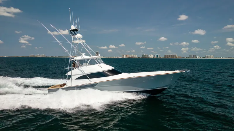 Slide: The Image of Starboard Side View in Motion The 2025 Viking 74 Convertible, 'It Just Takes Time', cuts through the water with precision and elegance. This starboard side view highlights its sleek hull design and powerful performance capabilities. The tuna tower and aerodynamic lines underscore its - 7531210