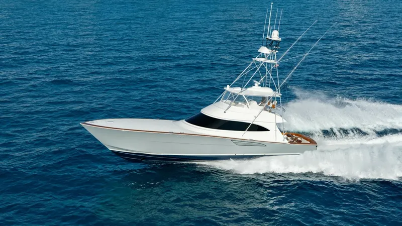 The Image of Viking 74 Convertible Cruising Profile The 2025 Viking 74 Convertible, 'It Just Takes Time', showcases its sleek lines and powerful design while cruising effortlessly through open waters. The vessel's prominent flybridge and modern hull design highlight Viking's commitment to performance and l - 7531151