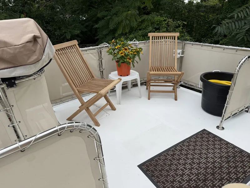 Slide: The Image of 43' Mainship trunk cabin seating - 7407600