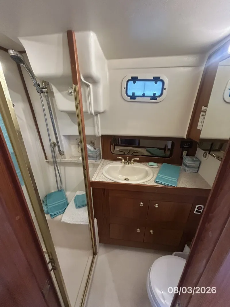 Slide: The Image of 43' Mainship master stateroom head - 7407559