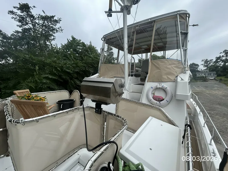 Slide: The Image of 43' Mainship trunk cabin forward - 7407601