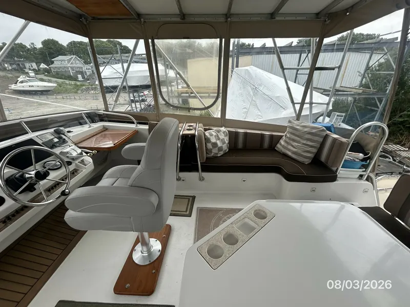 Slide: The Image of 43' Mainship flybridge starboard - 7407528