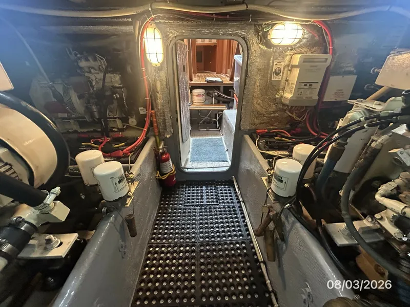 Slide: The Image of 43' Mainship engine room forward - 7407514