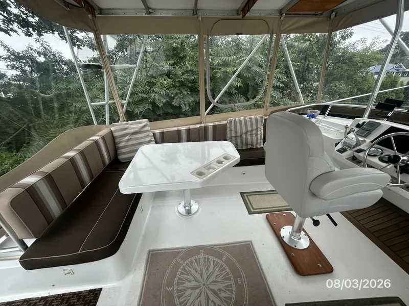 Slide: The Image of 43' Mainship flybridge port - 7407524