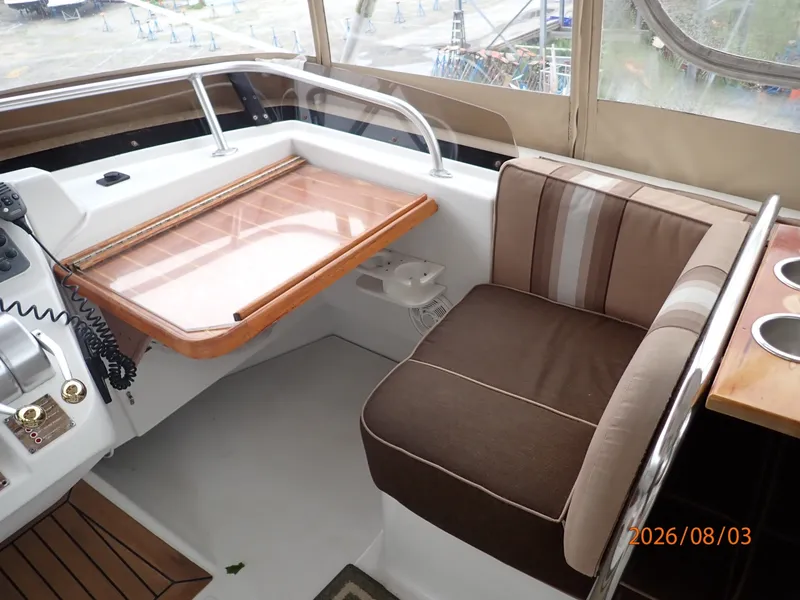 Slide: The Image of 43' Mainship flybridge starboard forward - 7407527