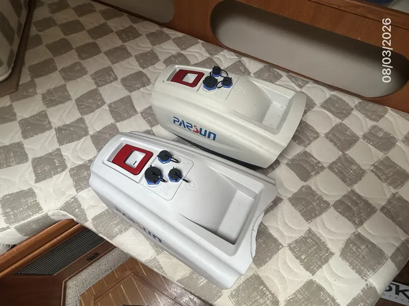 Slide: The Image of 43' Mainship tender outboard batteries - 7407595