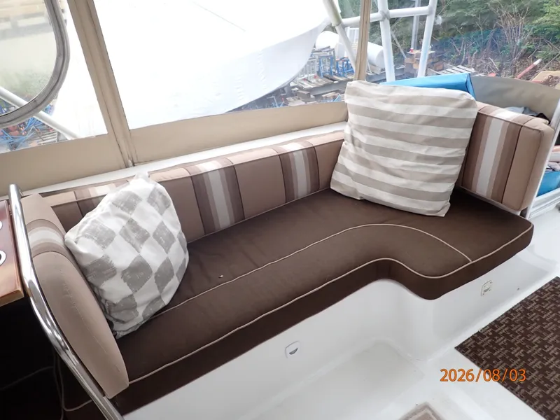 Slide: The Image of 43' Mainship flybridge starboard aft seating - 7407526