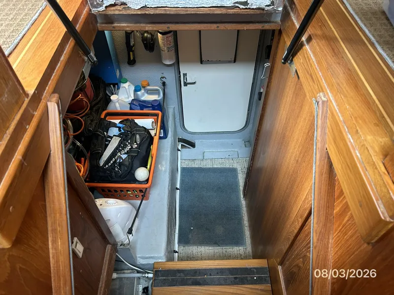 Slide: The Image of 43' Mainship engine room access - 7407512