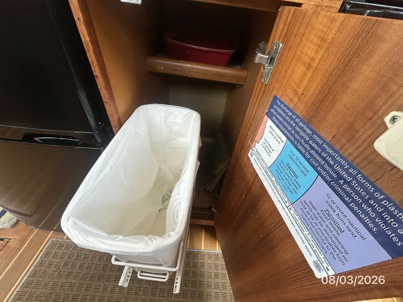 Slide: The Image of 43' Mainship galley trash compartment - 7407544