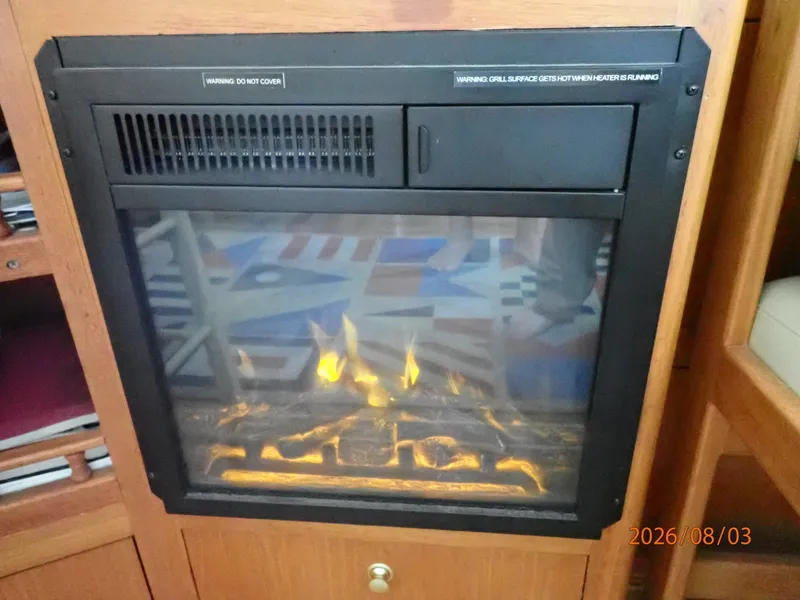 Slide: The Image of 43' Mainship salon fireplace - 7407574