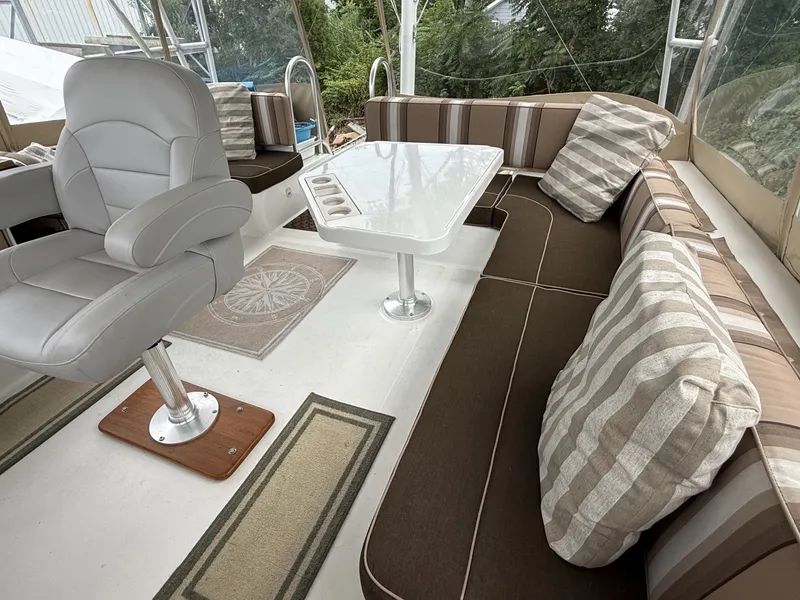 Slide: The Image of 43' Mainship flybridge port aft seating3 - 7407525
