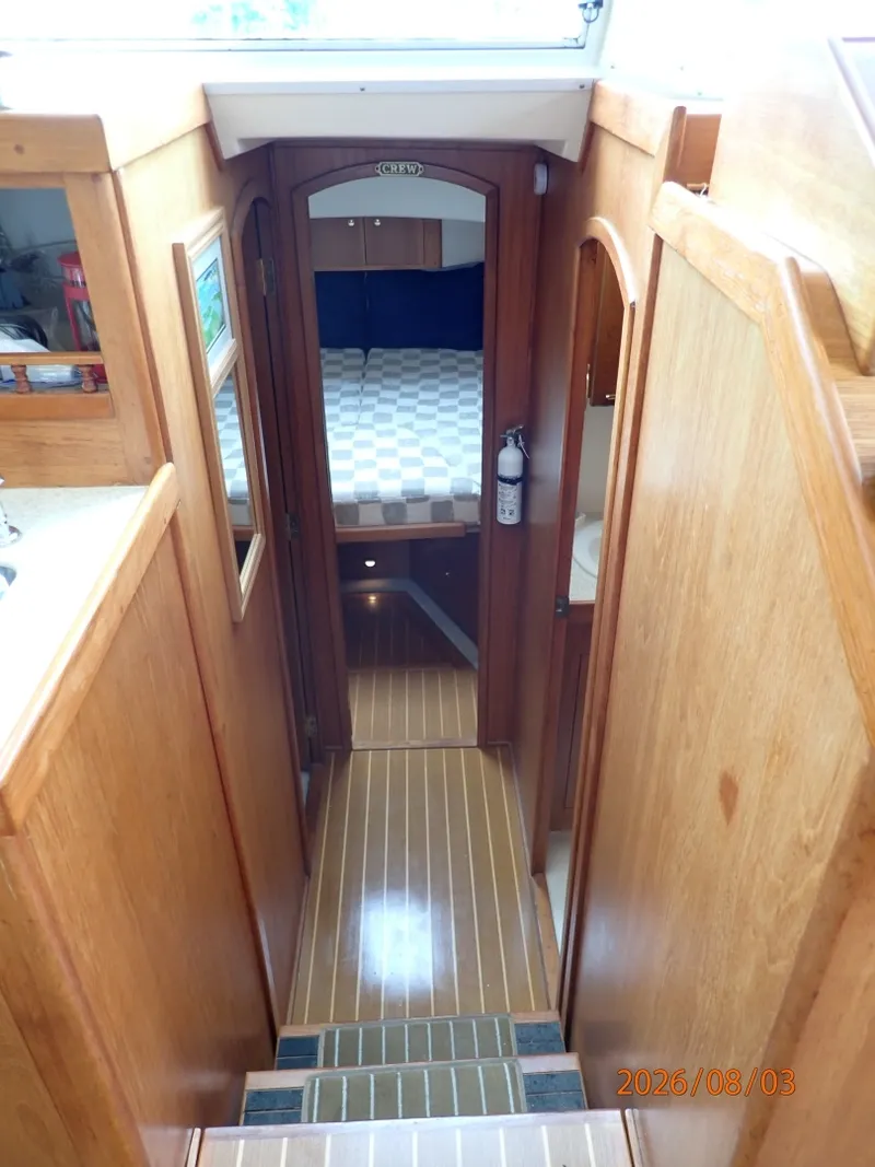 Slide: The Image of 43' Mainship guest stateroom companionway forward - 7407510