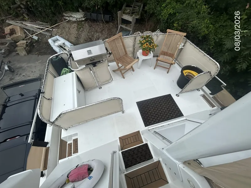Slide: The Image of 43' Mainship trunk cabin aft - 7407599