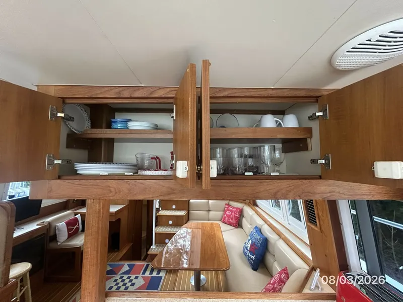 Slide: The Image of 43' Mainship galley storage - 7407538
