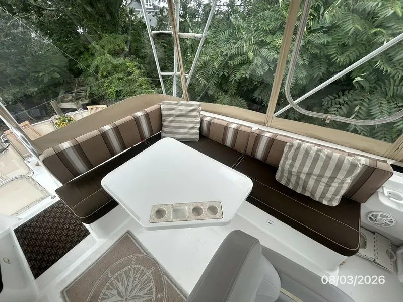 Slide: The Image of 43' Mainship flybridge port aft seating1 - 7407522