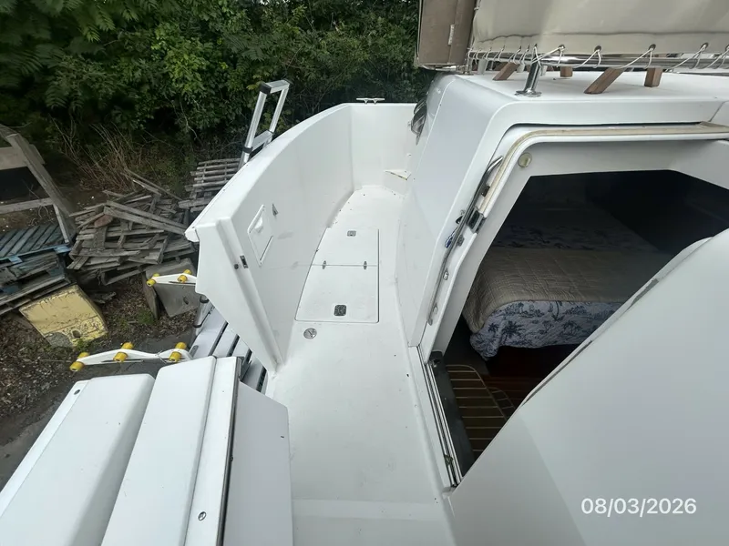Slide: The Image of 43' Mainship aftdeck port - 7407502