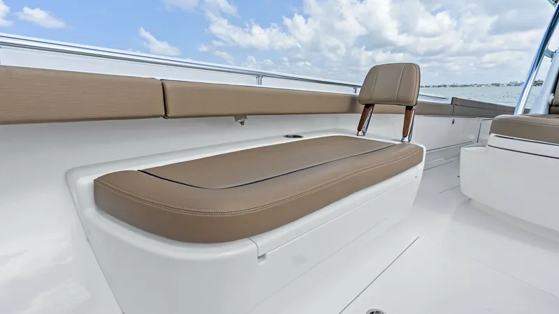 Slide: The Image of Spacious Aft Deck Seating Area The aft deck of the 2024 Valhalla V-37 features a comfortable seating area with plush, tan cushions that promise relaxation during your voyage. The sleek design is complemented by the durable, high-gloss finish of the deck, offering both style and practic - 7471188